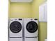 Laundry room featuring side by side washer and dryer and neutral paint at 8491 Sw 52Nd Lane Rd, Ocala, FL 34481