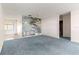 Living room featuring waterfall accent wall and tile floor, with partial view of bathroom at 8700 Sw 98Th Street Rd # E, Ocala, FL 34481