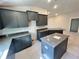 New kitchen showcasing modern cabinets, granite countertops, and a functional center island at 4365 Sw 90Th Pl, Ocala, FL 34476