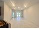 Spacious living room with tile flooring, recessed lights, and an open floor plan, perfect for entertaining at 4365 Sw 90Th Pl, Ocala, FL 34476