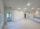 Open-concept living area with tile floors and ample space for entertaining at 4365 Sw 90Th Pl, Ocala, FL 34476