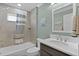 Cozy bathroom with a shower-tub combo and modern vanity at 6877 Minchew Cir, The Villages, FL 34762