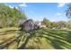 Charming home boasts a stone facade and lush landscaping on a sprawling, well-maintained lawn at 760 Sw 89Th Ter, Ocala, FL 34481