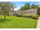 Lovely home with well-manicured landscaping, colorful flowers, and a neatly edged lawn at 760 Sw 89Th Ter, Ocala, FL 34481