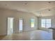 Open living room with lots of light, neutral walls, and tile flooring at 4498 Sw 90Th Lane Rd, Ocala, FL 34476