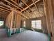 Framed interior with insulation and windows, showing construction progress at 4516 Sw 90Th Lane Rd, Ocala, FL 34476