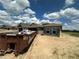 New homes under construction with dumpster, concrete masonry walls and framing, in a community at 4528 Sw 90Th Lane Rd, Ocala, FL 34476