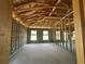 The interior framing of a new home showing windows installed in CMU block walls at 4528 Sw 90Th Lane Rd, Ocala, FL 34476