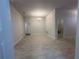 Open-concept living room with tile flooring and natural light at 4528 Sw 90Th Lane Rd, Ocala, FL 34476