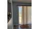 Bright and airy room with slider doors providing access to the screened in patio at 9090 Se 135Th Loop, Summerfield, FL 34491