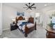 Well-lit main bedroom featuring detailed wood furniture and a serene blue color scheme at 9307 San Jose Blvd, Howey In The Hills, FL 34737