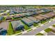 Aerial view of a residential neighborhood with modern homes and green spaces at 5530 Nw 40Th Loop, Ocala, FL 34482
