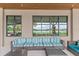 Comfortable outdoor seating area with lake views and stylish furniture on the patio at 5530 Nw 40Th Loop, Ocala, FL 34482