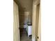 Bathroom with tiled shower and new white vanity, in need of final touches at 714 Nw 2Nd St, Ocala, FL 34475