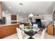 Open-concept kitchen featuring a breakfast nook and a view into the living room at 9230 Sw 66Th Loop, Ocala, FL 34481