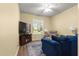Cozy living room with comfortable seating and a large window at 9230 Sw 66Th Loop, Ocala, FL 34481