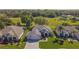 This aerial view showcases the home's manicured landscaping, spacious lot, and inviting curb appeal at 13968 Se 96Th Cir, Summerfield, FL 34491