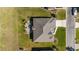 Bird's eye view of home featuring landscaping, patio and roof at 2380 Nw 55Th Avenue Rd, Ocala, FL 34482