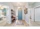 Bright entryway featuring stylish decor and a glimpse into the living spaces at 2380 Nw 55Th Avenue Rd, Ocala, FL 34482