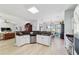 Spacious eat-in kitchen featuring granite countertops, ample light and stainless dishwasher at 2380 Nw 55Th Avenue Rd, Ocala, FL 34482