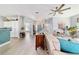 Spacious living room featuring wood floors, open floor plan, and bright natural light at 2380 Nw 55Th Avenue Rd, Ocala, FL 34482