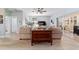 Comfortable living room with wood floors, a ceiling fan, and sliding glass doors at 2380 Nw 55Th Avenue Rd, Ocala, FL 34482