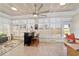 Bright sunroom with tongue and groove ceiling, bar area, and lots of natural light at 2380 Nw 55Th Avenue Rd, Ocala, FL 34482
