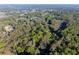 Aerial view of a wooded homesite showcasing the beautiful surrounding greenery at 2570 Se Highway 42, Summerfield, FL 34491