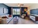 Comfortable living room with neutral color scheme, ceiling fan, and a view of the lake at 31 Hickory Crse, Ocala, FL 34472