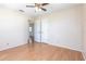 Cozy bedroom with hardwood floors and an open doorway, providing an inviting atmosphere at 3275 Nw 44Th Ct, Ocala, FL 34482