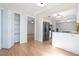 Open kitchen view with modern stainless steel refrigerator and storage space at 3275 Nw 44Th Ct, Ocala, FL 34482