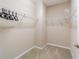 Walk-in closet with metal shelving for optimal organization and storage space at 3935 Nw 46Th Ter, Ocala, FL 34482
