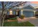 Charming single-Gathering home with a brick walkway and well-manicured landscaping at 3935 Nw 46Th Ter, Ocala, FL 34482