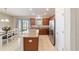 Bright kitchen features stainless steel appliances, granite countertops and sliding door access to the lanai at 3935 Nw 46Th Ter, Ocala, FL 34482
