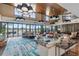 Spacious clubhouse lobby with high ceilings, modern lighting, and comfortable seating areas at 3935 Nw 46Th Ter, Ocala, FL 34482