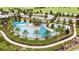 Aerial view of a stunning resort style zero entry pool with palm trees and plenty of seating at 3935 Nw 46Th Ter, Ocala, FL 34482