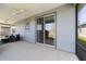 Covered and screened patio with sliding glass door access at 3935 Nw 46Th Ter, Ocala, FL 34482