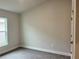 Light and airy bedroom with a large window, providing ample natural light and a relaxing atmosphere at 4504 Sw 90Th Lane Rd, Ocala, FL 34476