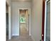 Inviting entryway featuring neutral walls and a tile floor, creating a clean and welcoming space at 4504 Sw 90Th Lane Rd, Ocala, FL 34476