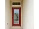 Elegant front door with decorative glass insert, adding a touch of sophistication to the home's entrance at 4504 Sw 90Th Lane Rd, Ocala, FL 34476