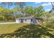 Well maintained single story home with lush green lawn at 4585 Se 136Th St, Summerfield, FL 34491