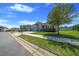 Charming single-Gathering home with a well-manicured lawn, lush landscaping, and a three-car garage at 5048 Sw 57Th Pl, Ocala, FL 34474