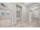 Open foyer featuring decorative tile and views of multiple rooms at 5048 Sw 57Th Pl, Ocala, FL 34474