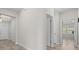 Hallway with decorative floors and multiple rooms visible at 5048 Sw 57Th Pl, Ocala, FL 34474