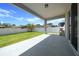 Covered patio offers a perfect spot for outdoor entertaining and relaxation at 5048 Sw 57Th Pl, Ocala, FL 34474