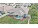 Aerial view of home highlighting fenced backyard and screened-in patio at 6 Diamond Cove Ct, Ocala, FL 34472
