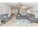 Spacious living room with cozy seating arrangements and a patterned rug at 6 Diamond Cove Ct, Ocala, FL 34472