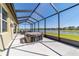 Enjoy the lake view from the hot tub on this screened in lanai at 6558 Sw 94Th Cir, Ocala, FL 34481