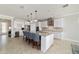 Island kitchen featuring granite counters, stainless steel appliances and dining area at 6558 Sw 94Th Cir, Ocala, FL 34481