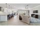 Open-concept living space with seamless transition from the kitchen to living room and dining area at 6558 Sw 94Th Cir, Ocala, FL 34481